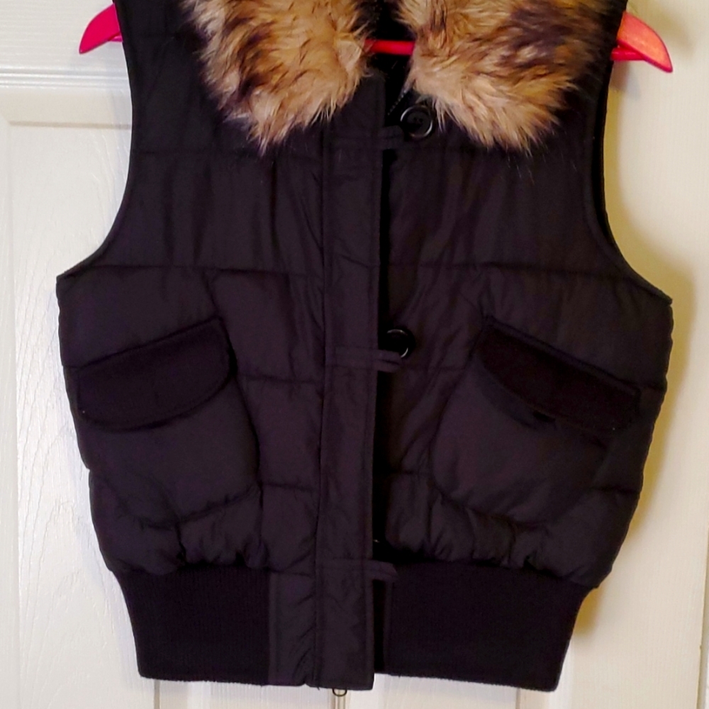 Black zip-up button fast with faux collar size medium with pockets